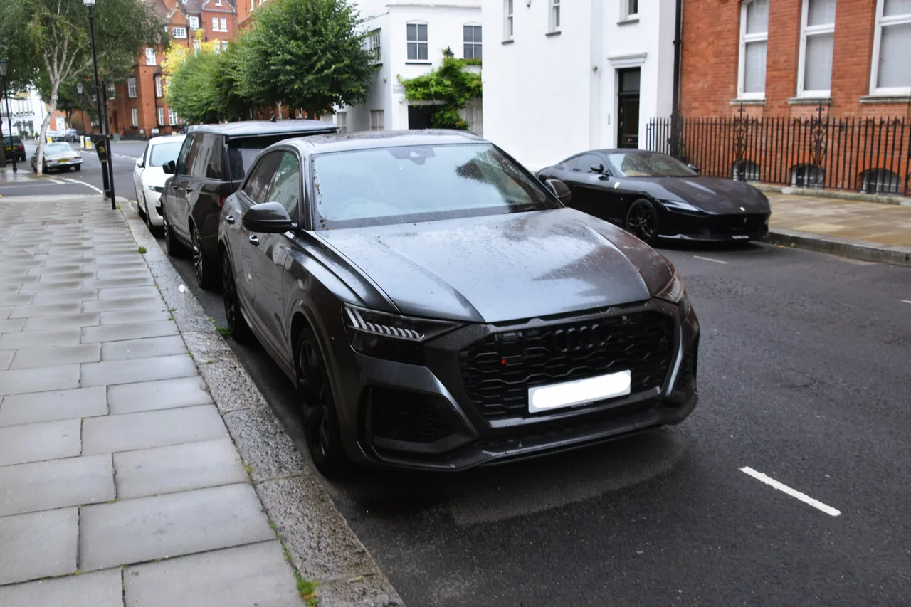 Dark Audi RS Q8 parked on a London street